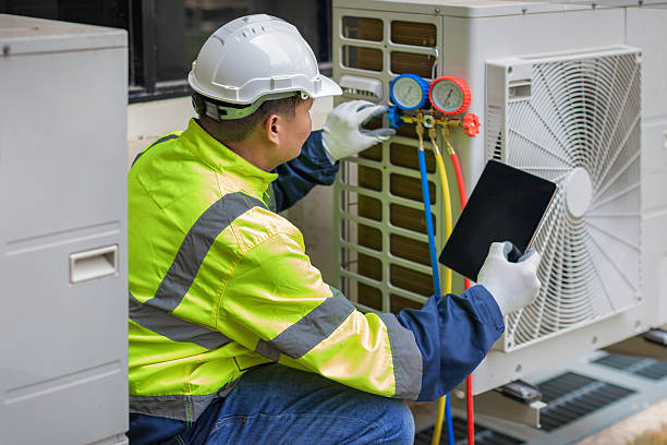 Professional Ac Installation technician working in Wellesley Hills, MA